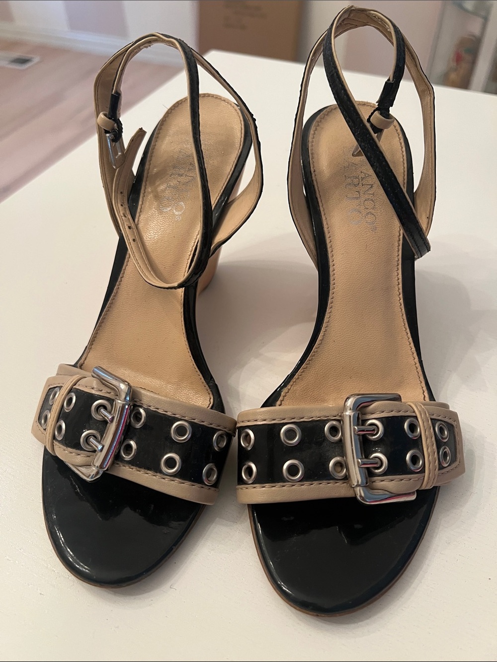 Franco Sarto Black and Beige Grommet Buckle Wedge Sandals